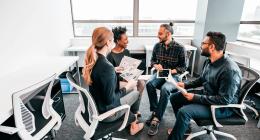 Colleagues working in a meeting room 